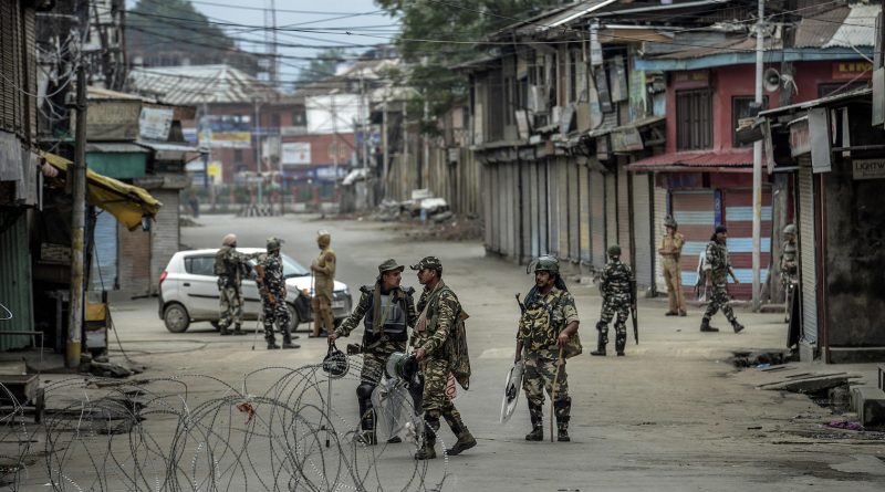Barbed wire placed by security personnel stretches across a srinagar street in indian controlled kashmir, aug. 11, 2019. (atul loke/the new york times)